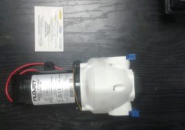 Flojet water system pump for laundry machine